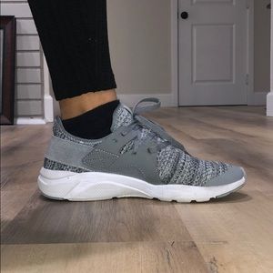 Grey running shoe (fairly worn)